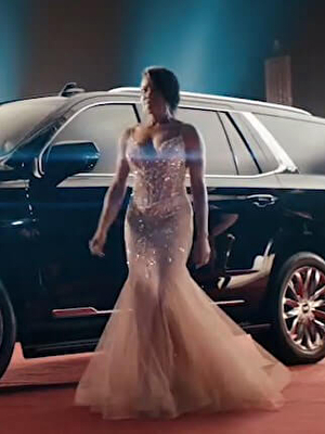 Regina King wears JOVANI style 63704 in the new Cadillac 2021