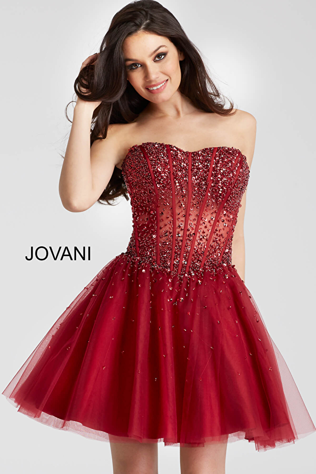 Model wearing Jovani style 55142 burgundy prom dress