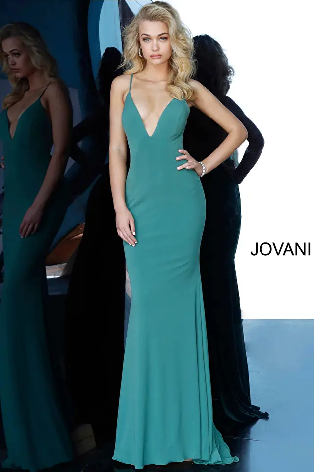 Model wearing Jovani style 00512 green prom dress