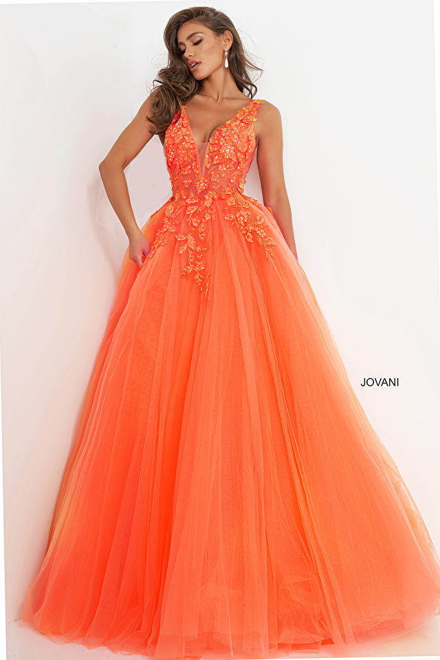 Model wearing Jovani style 02840 orange prom dress