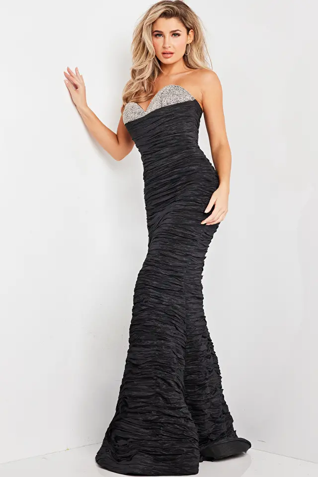 Model wearing Jovani style 23546 black prom dress