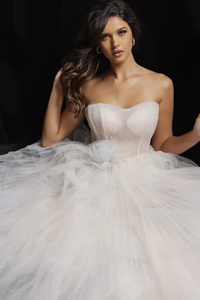 Model wearing Jovani style 38537 blush dress