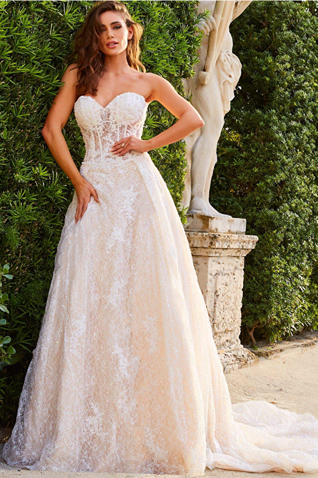 Model wearing Jovani style JB05349 lace wedding dress