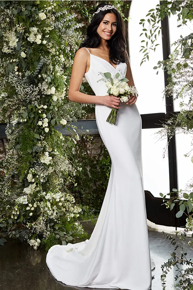 Model wearing Jovani style JB2507 fitted wedding dress