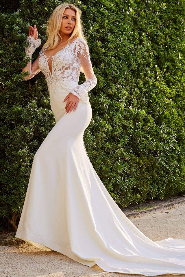 Model wearing Jovani style jb07632 lace wedding dress