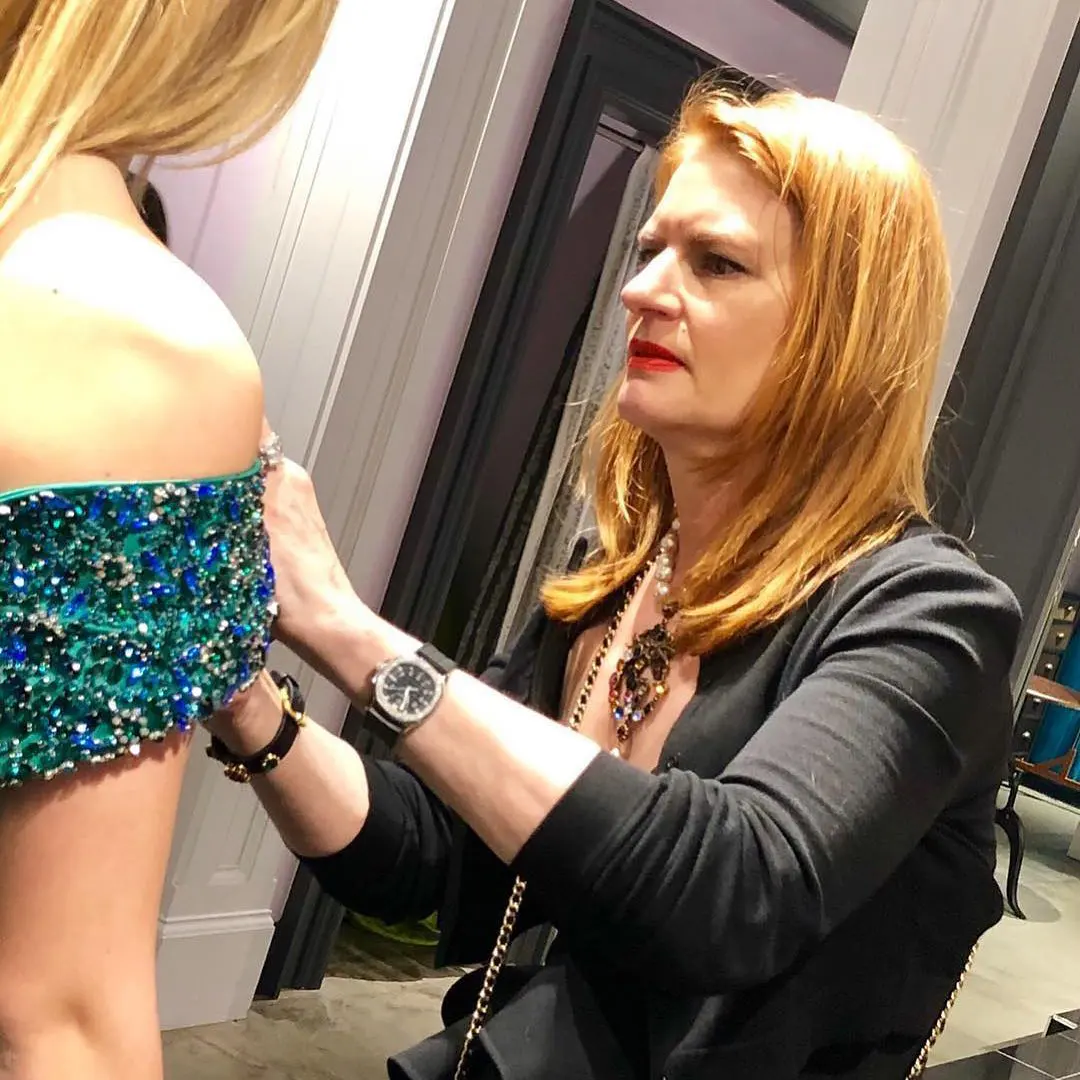 Julie DuRocher working on a couture dress design