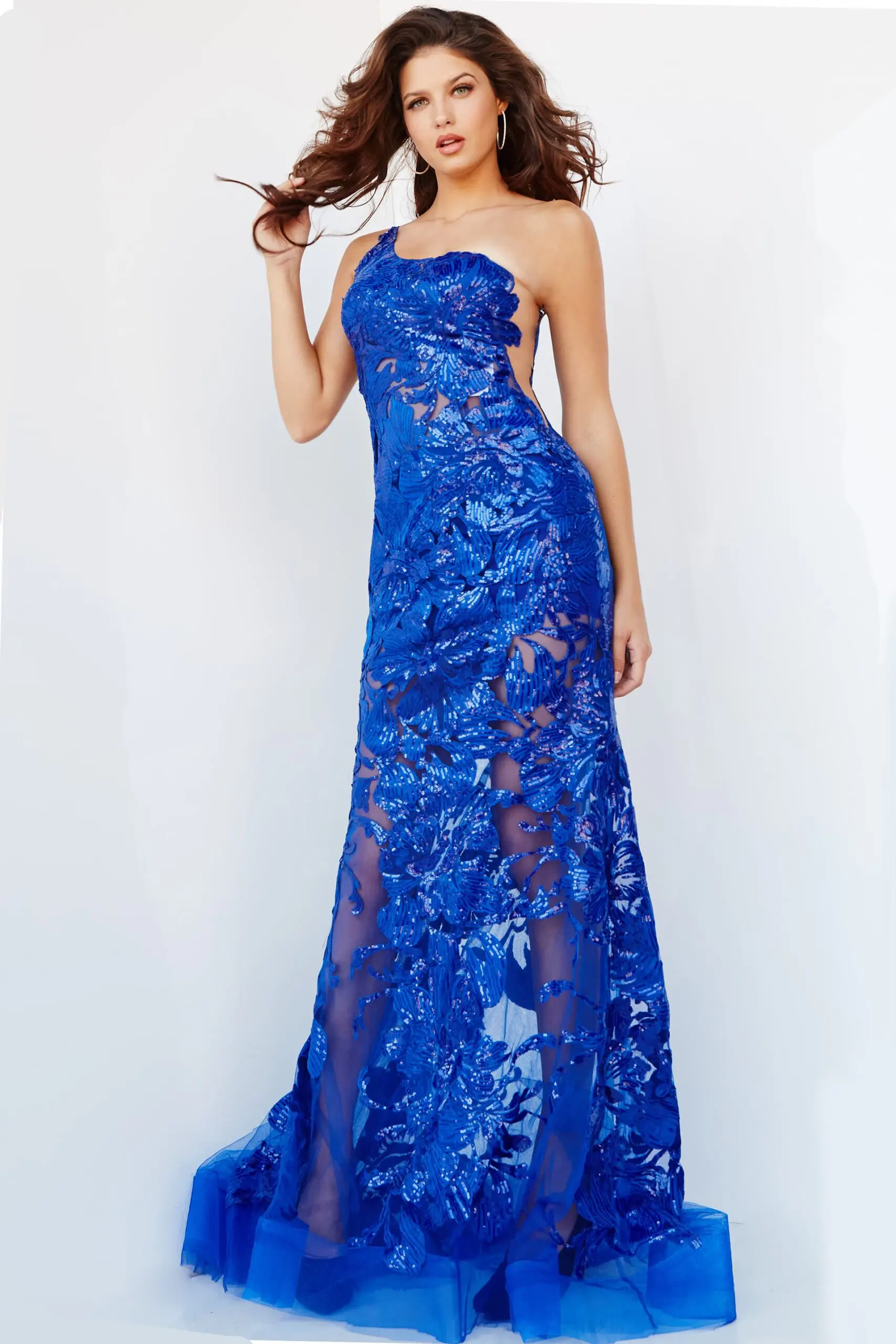 Model wearing Jovani 02895 in royal blue with one-shoulder beaded design, front view.