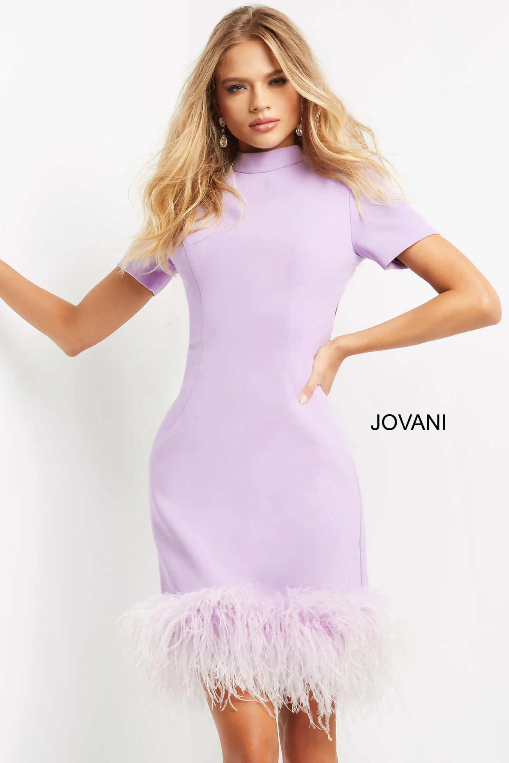 Model wearing Jovani 08253 lilac short dress with high neckline and feathered hem.