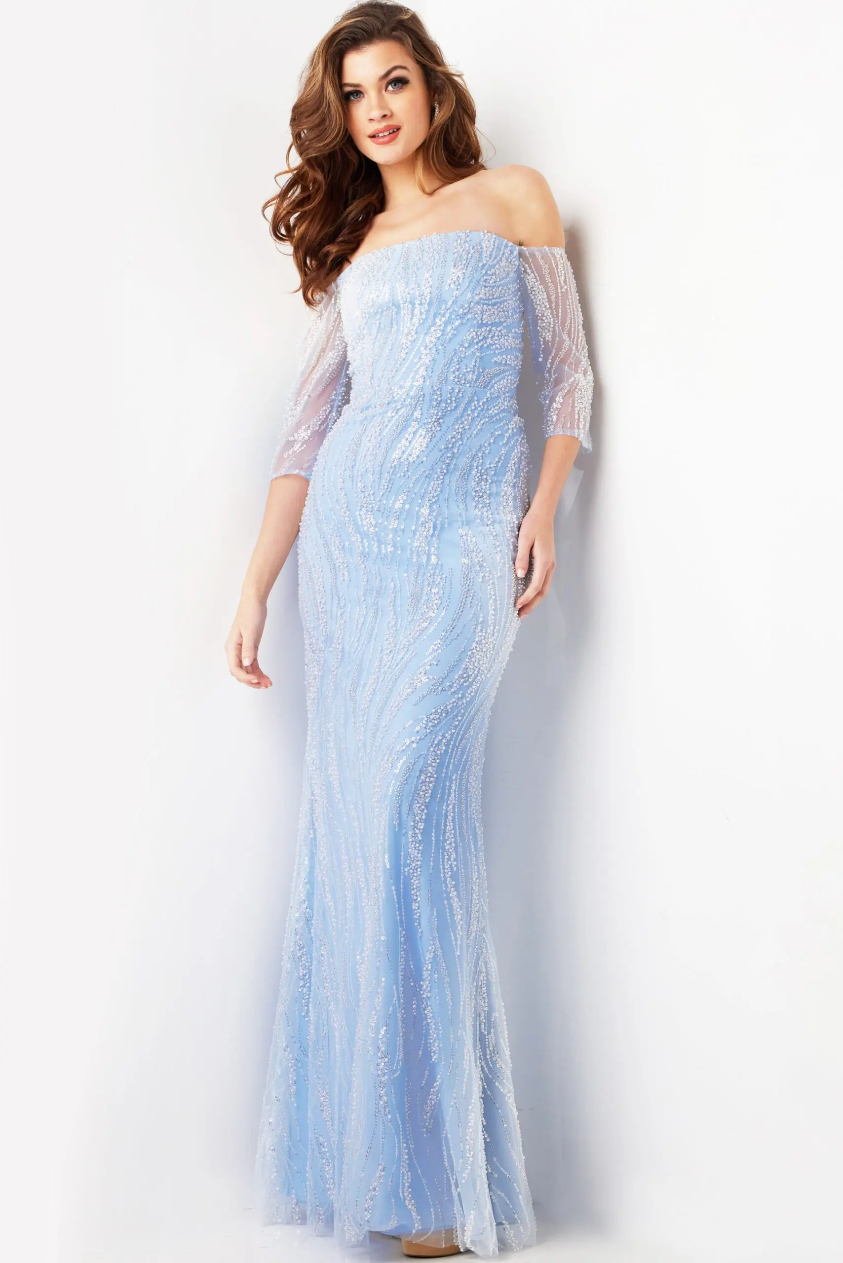 Model wearing Jovani 38614 light blue gown with sequin embellishments, front view