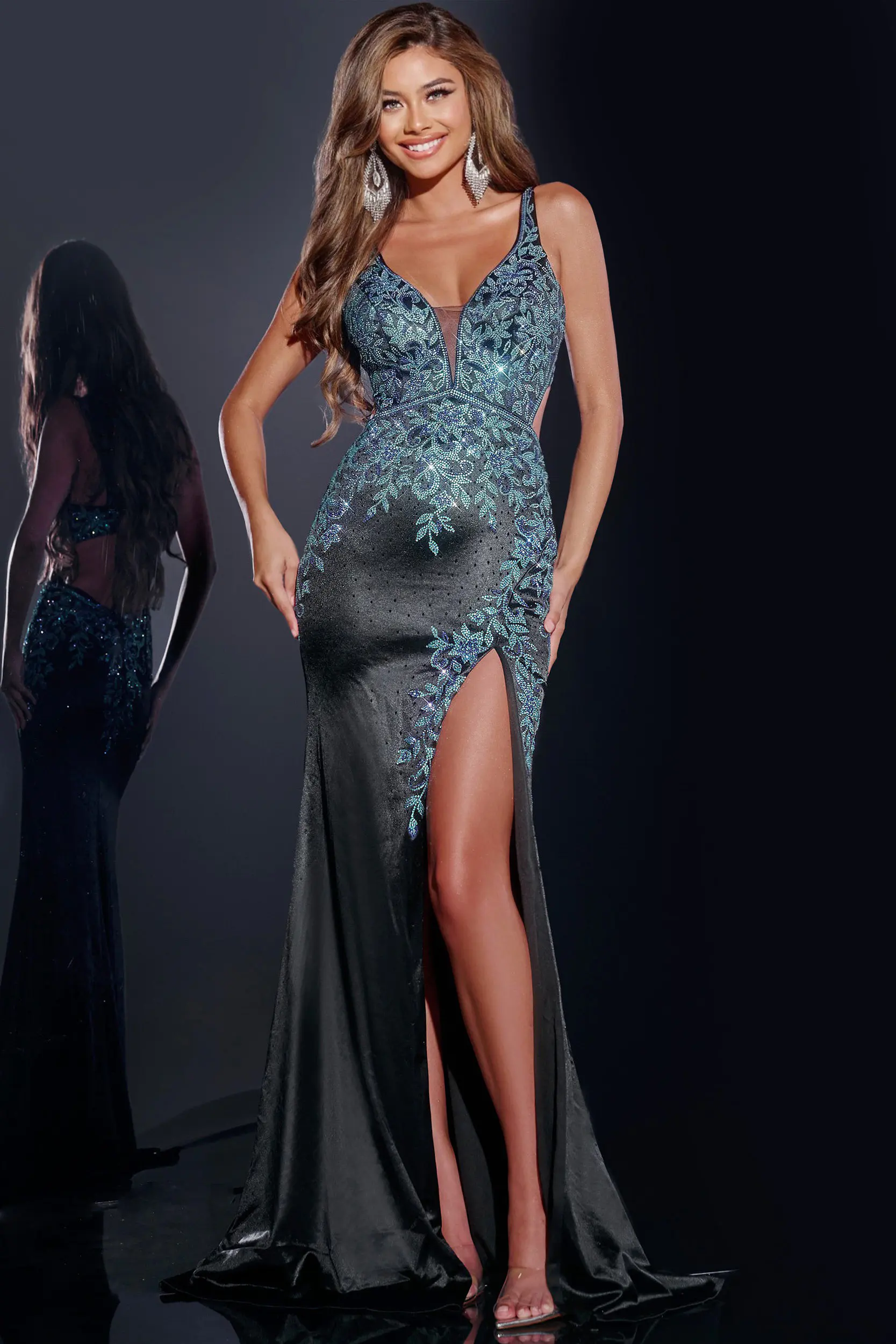 model wearing Jovani 43796 black gown with V-neck and high slit