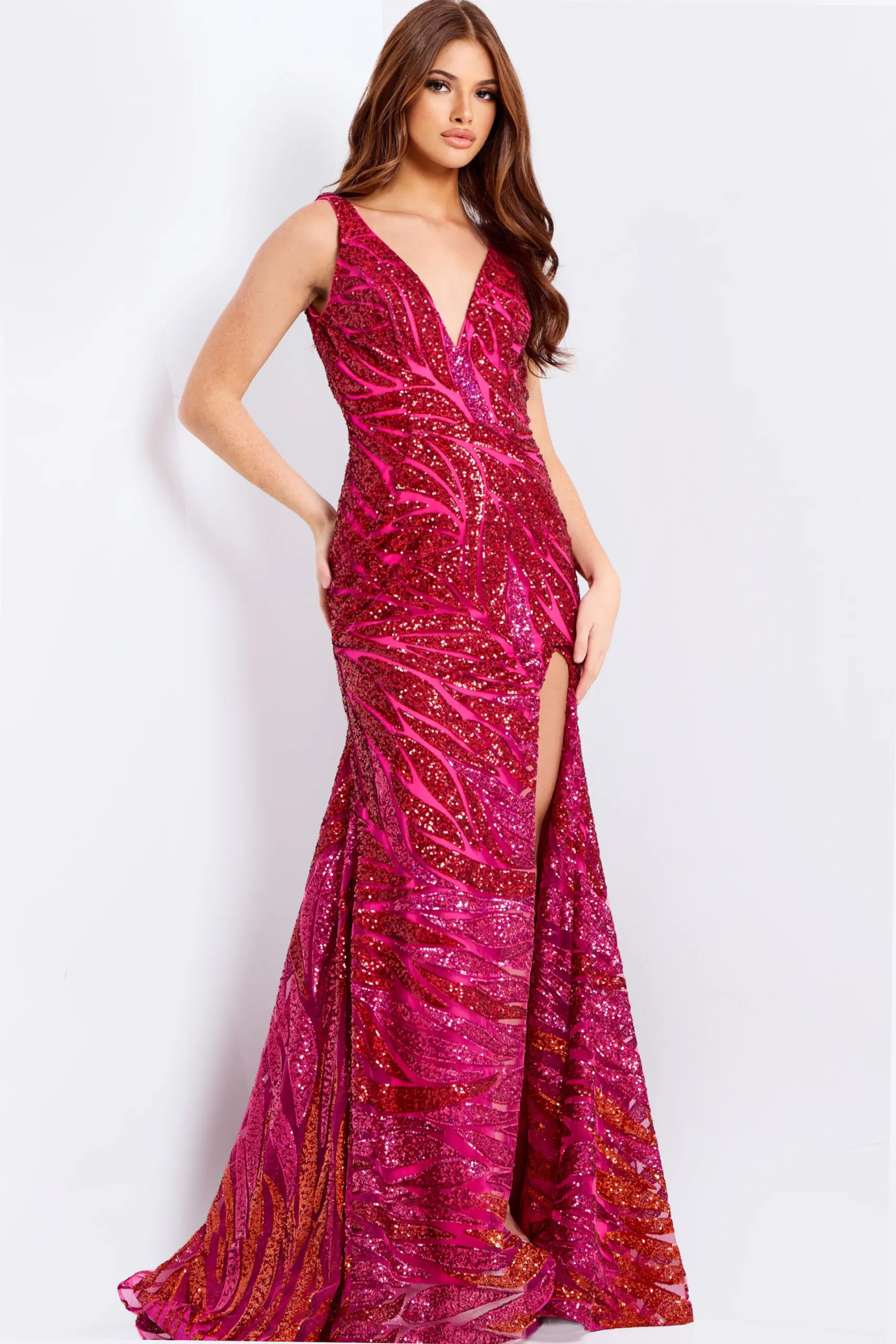 Hot pink sequin prom dress with V-neck and slit