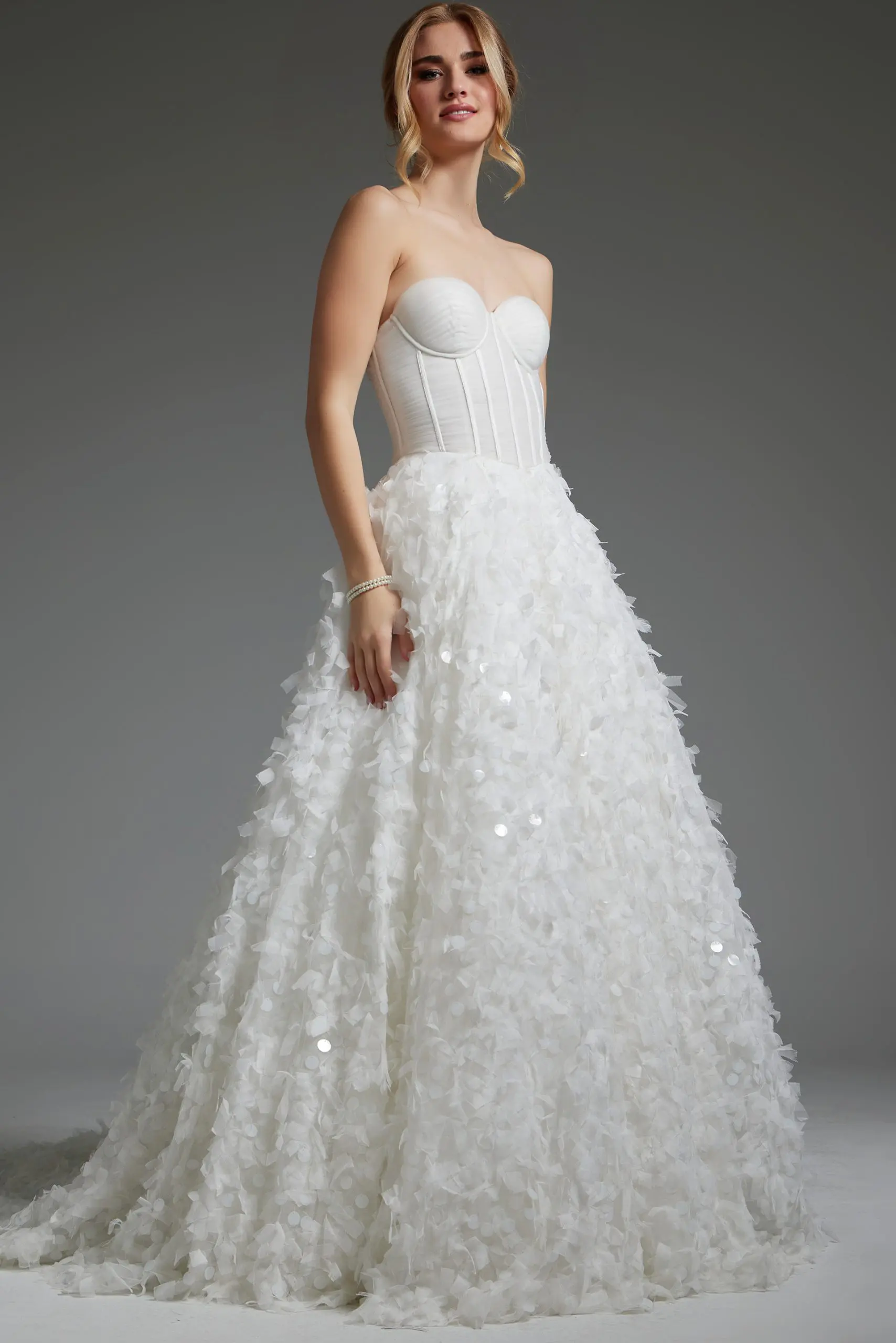 model wearing Jovani JB26295 elegant white gown with sweetheart neckline