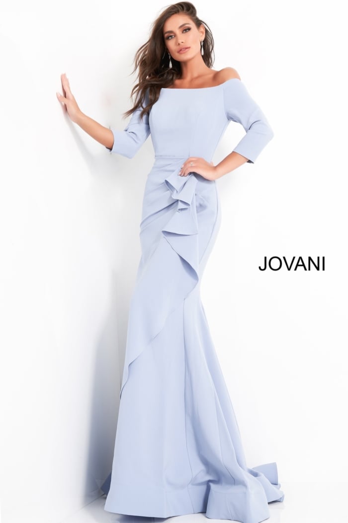 Model in Jovani 00446 light blue evening gown showcasing ruffle detail and elegant silhouette.