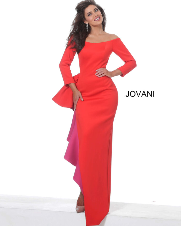 Model wearing Jovani 00574 red gown showcasing the off-shoulder design and side ruffle.