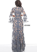 Back view of Jovani 00752 navy gown with lace overlay and elegant flow.
