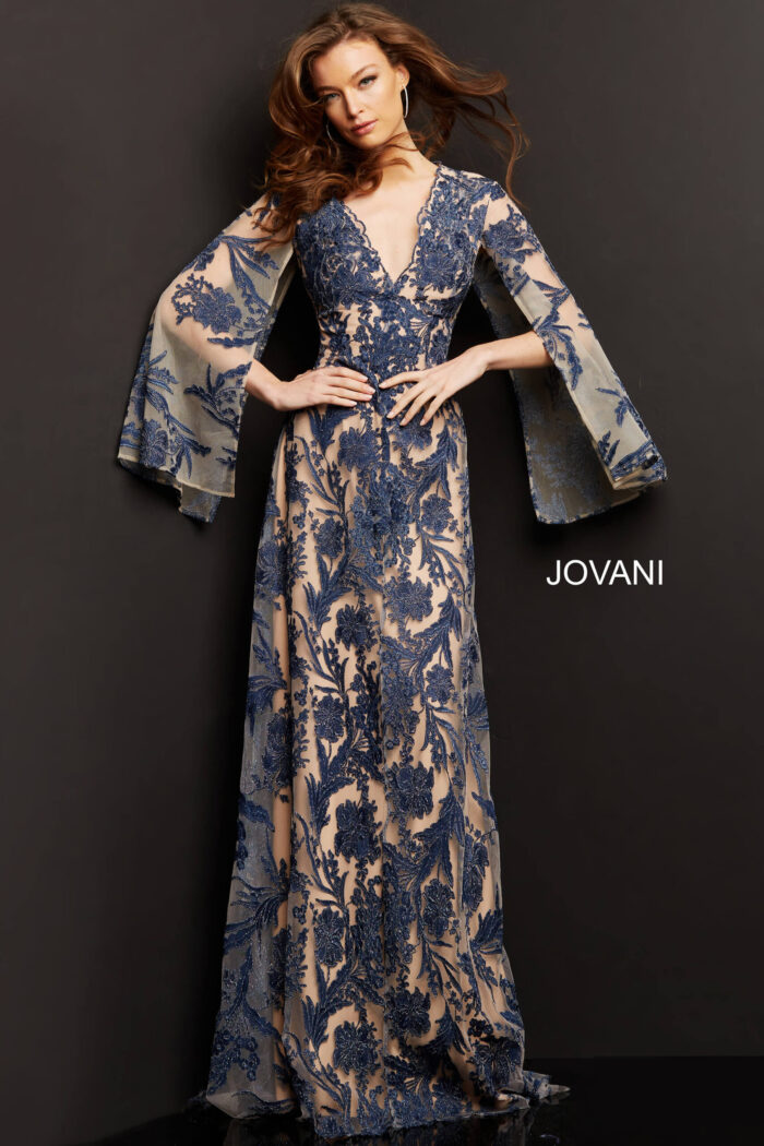 model wearing Jovani 00752 navy A-line gown with floral embroidery and bell sleeves