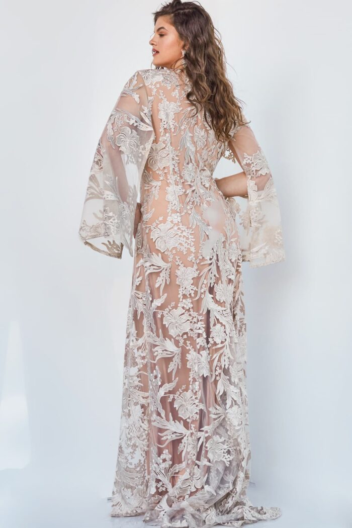 back view of model wearing Jovani 00752 beige A-line gown with floral embroidery