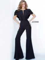 Model wearing Jovani 00762 black jumpsuit with V-neckline and flutter sleeves, front view.