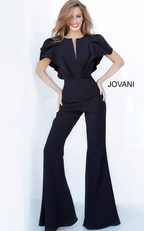 Model wearing Jovani 00762 black jumpsuit with V-neckline and flutter sleeves, front view.