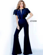 Model wearing Jovani 00762 black jumpsuit with V-neckline and flutter sleeves, back view.