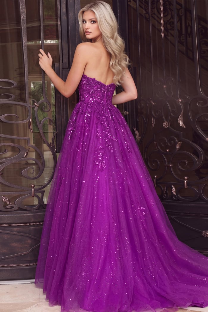Vibrant purple strapless ball gown with sparkling floral details and a voluminous skirt.