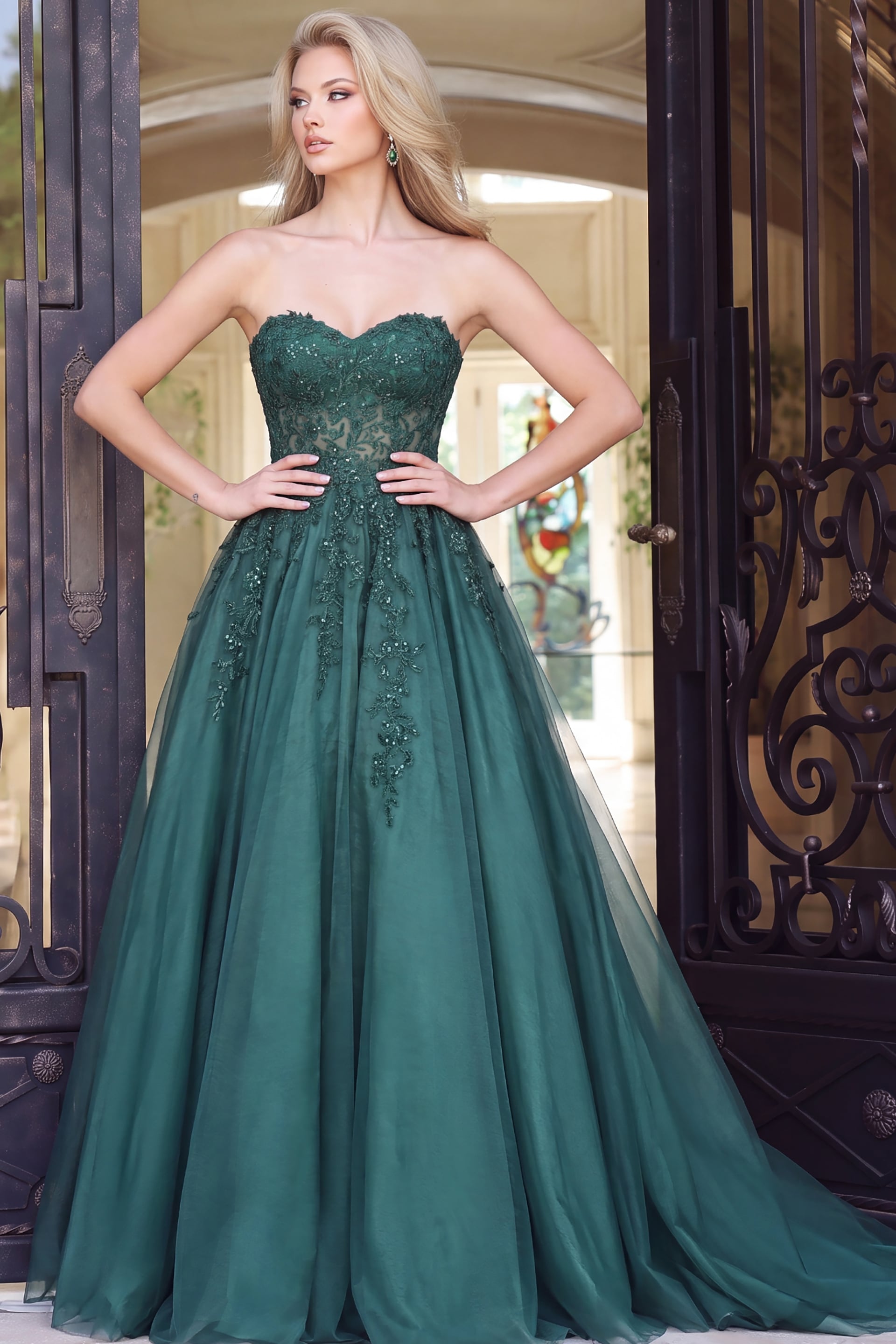 ball gown with sparkling embellishments and a sweeping tulle skirt.