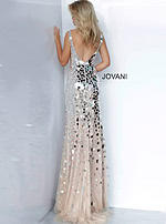 Model in Jovani 02479 nude dress with sequined details and high slit, front pose.