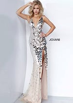 Model wearing Jovani 02479 nude gown with high slit and embellishments.