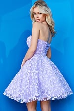 Model wearing Jovani K02564 dress in lilac, showing corset-style back with floral appliques.
