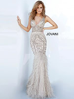 side view of model in Jovani 02798 silver gown with feathered mermaid skirt