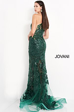 Model wearing Jovani 02895 in forest green, back view highlighting intricate beading.