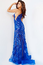 Model wearing Jovani 02895 in royal blue, back view showing beaded details.