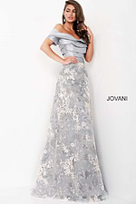 Model wearing Jovani 02921 gray multi-tonal dress with floral lace details, front view.