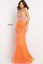 Model in Jovani 03023 orange gown with textured feather accents and V-neck, front view.