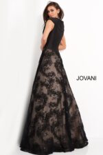 Model wearing Jovani 03330 black dress, back view showing elegant lace detailing.