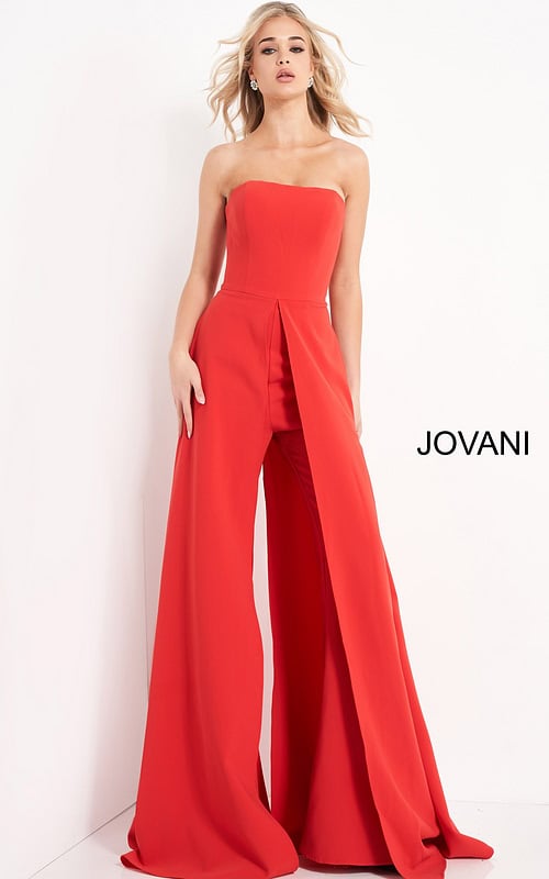 Model wearing Jovani 03529 red jumpsuit, front view, with strapless design and wide-leg silhouette.