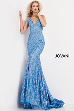 Model posing in Jovani 03570 light blue mermaid gown with a deep V-neckline.