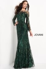 Full length of model in Jovani 03936 green gown with sheer long sleeves.