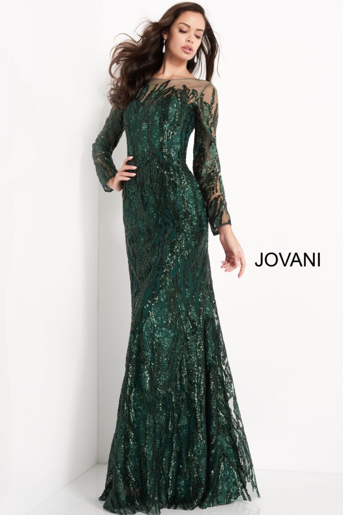 Full length of model in Jovani 03936 green gown with sheer long sleeves.
