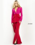Model in Jovani 04184 showing red and fuchsia color-block jacket with floor-length pants.