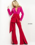 Model wearing Jovani 04184 showcasing structured shoulders and front slits on pants.
