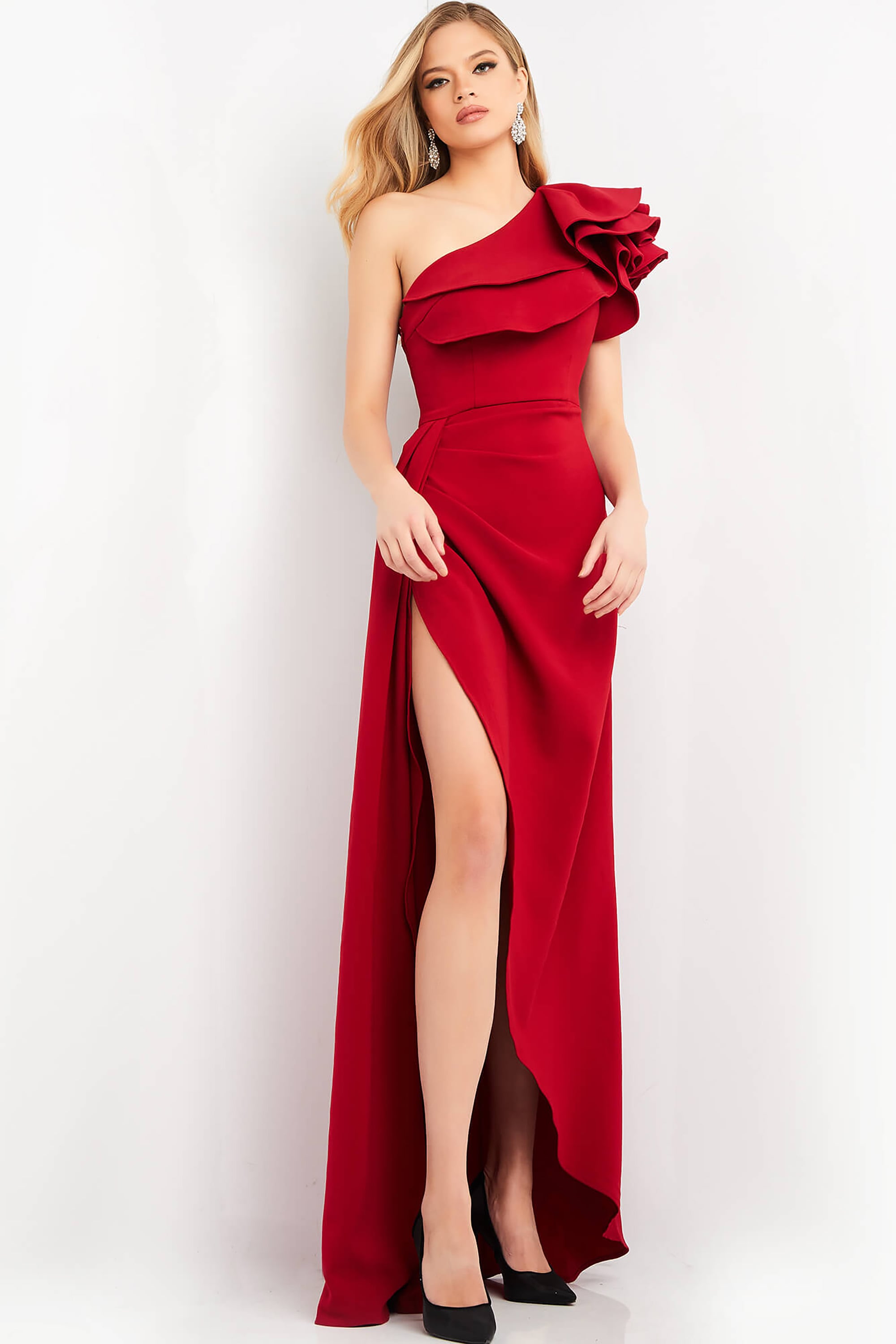 04352-Cranberry-long.jpg Model wearing Jovani 04352 elegant red dress with one-shoulder ruffle and high slit, front view.