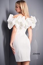 Model wearing Jovani 04367 white dress with ruffled neckline, back view.