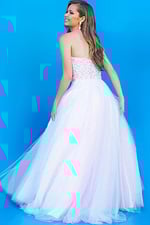 model wearing Jovani K02229 blue gown back view against blue background