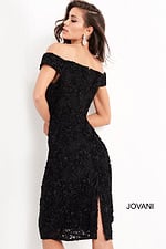 model wearing Jovani 04763 back view black dress with floral lace