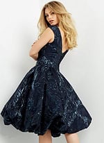 Back view of model wearing Jovani 05016 navy A-line dress.