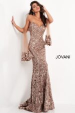 Model shining in Jovani 05054 copper dress with sequin detailing.
