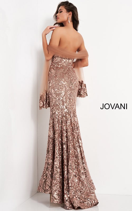 Back view of model in Jovani 05054 mermaid gown with elegant sequin embellishments.