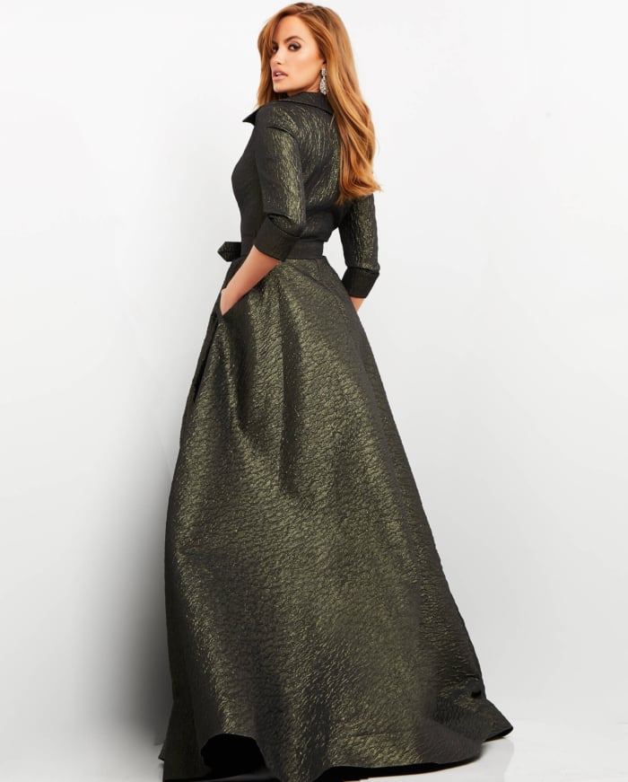 Model wearing Jovani 05075 olive green dress, angled back view