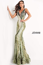 Model wearing Jovani 05103 green floor-length mermaid dress with deep V-neckline.